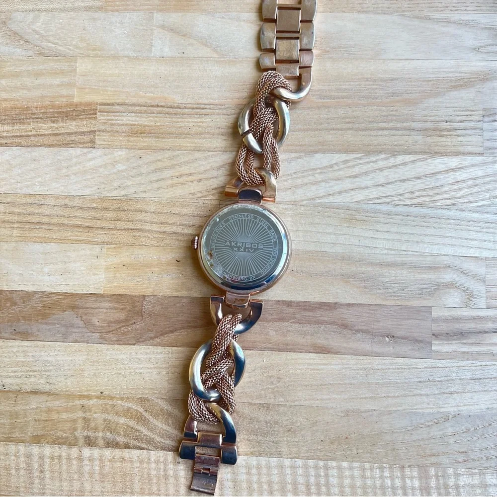 Akribos XXIV ladies rose gold tone fashion bracelet watch NEW BATTERY